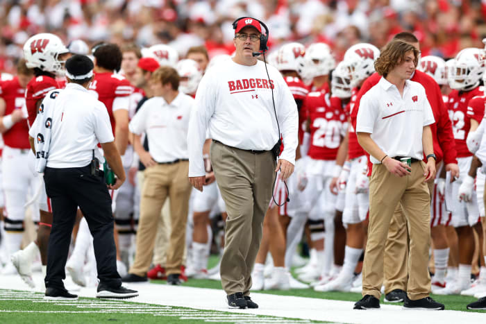 Wisconsin head coach Paul Chryst looking up at the video board against Washington State.